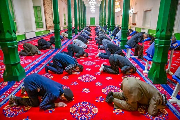 With feasts and patrols, China tries to keep Uyghurs from fasting