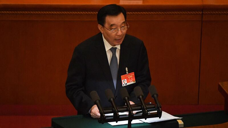 2021年3月5日,中国全国人大副委员长王晨在人大开幕式上。(法新社)