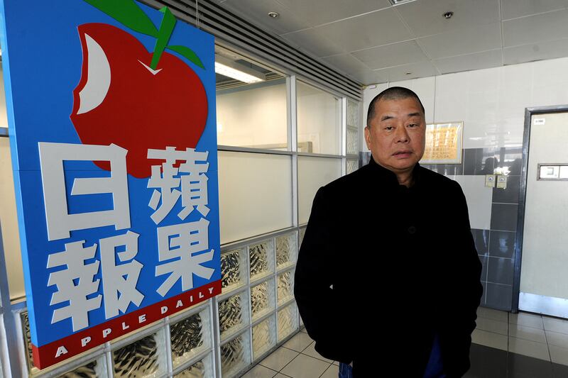 This photo taken on Feb. 7, 2011, shows Hong Kong media tycoon Jimmy Lai outside his company's headquarters in Hong Kong.