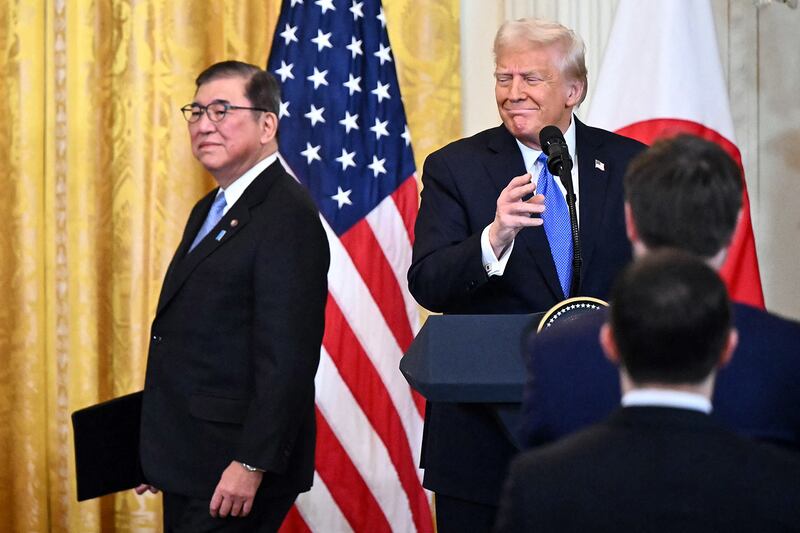 President Donald Trump and Japanese Prime Minister Shigeru Ishiba arrive for a joint press conference in the East Room of the White House in Washington, Feb. 7, 2025.