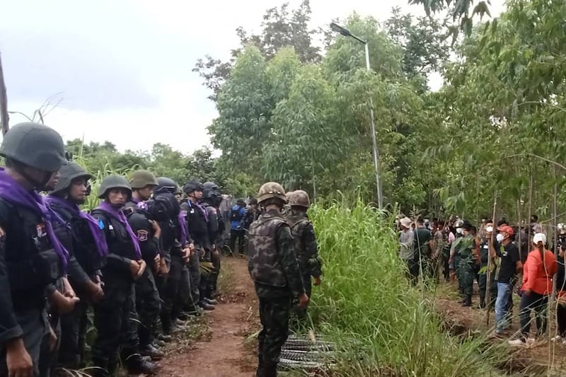 This photo released by the Royal Thai Army  shows Thai Border Patrol Police (BPP) and police facing Cambodian people in a disputed area along the Thailand-Cambodian border in Sa Kaeo province, Sept. 17, 2025.