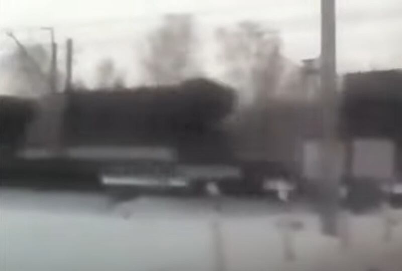 An image made from video shows what Ukrainian defense researcher Andriy Tarasenko says is North Korea’s KN-15 ballistic missile system spotted in Russia.
