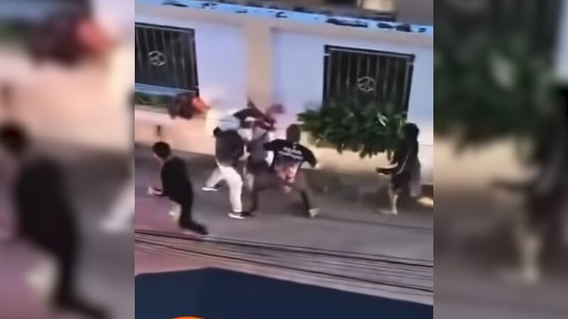 This image made from video shows a Cambodian migrant worker being beaten by a group of Thais.