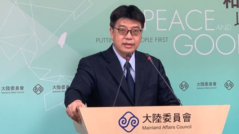 针对中共四中全会公报提到台湾时说要完善“一国两制”,台湾大陆委员会发言人邱垂正表示,台湾人民坚决不接受“一国两制”。(资料照、记者夏小华摄)
